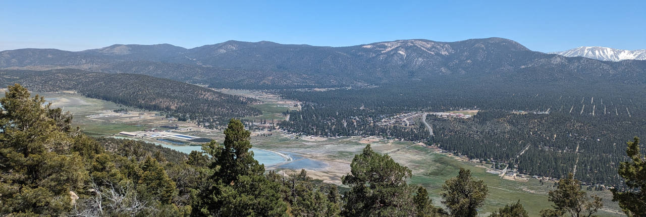 The Big Bear valley and Baldwin Lake seen from a rocky summit in summer